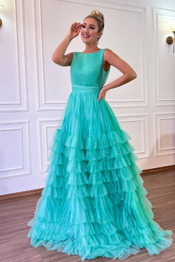 vestido de festa longo verde tiffany madrinha. Vestido de tule sem decote com cintura marcada e babados na saia