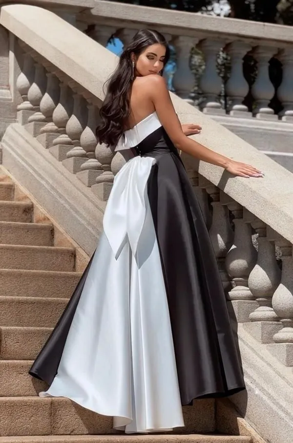 vestido de festa longo estilo princesa preto e branco com maxi laço nas costas